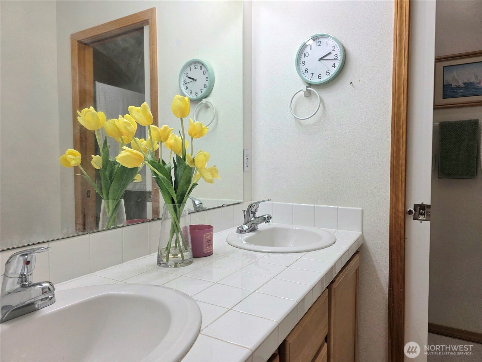 18866 108th Lane SE, Renton, WA 98055 2nd floor - bathroom in the primary bedroom. A dual-sink vanity provides convenient personal space.