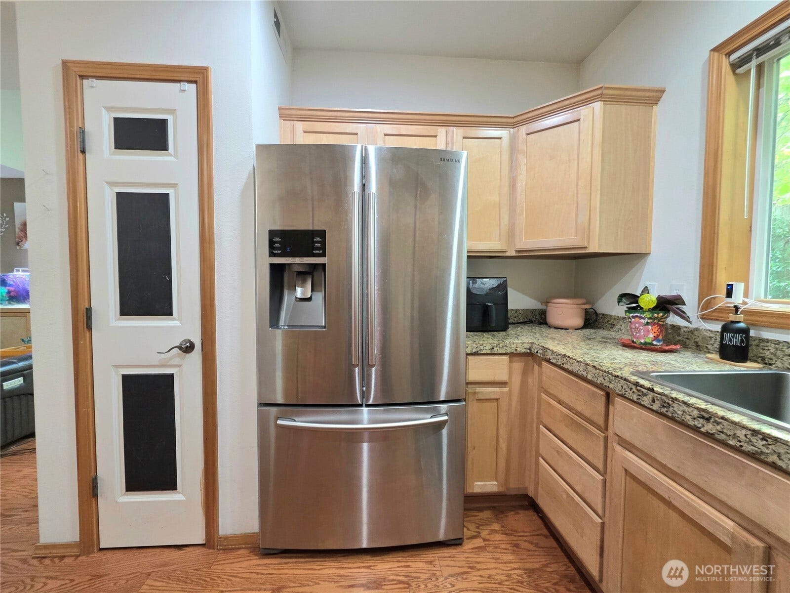 18866 108th Lane SE, Renton, WA 98055 Main floor - kitchen. The pantry provides added storage.