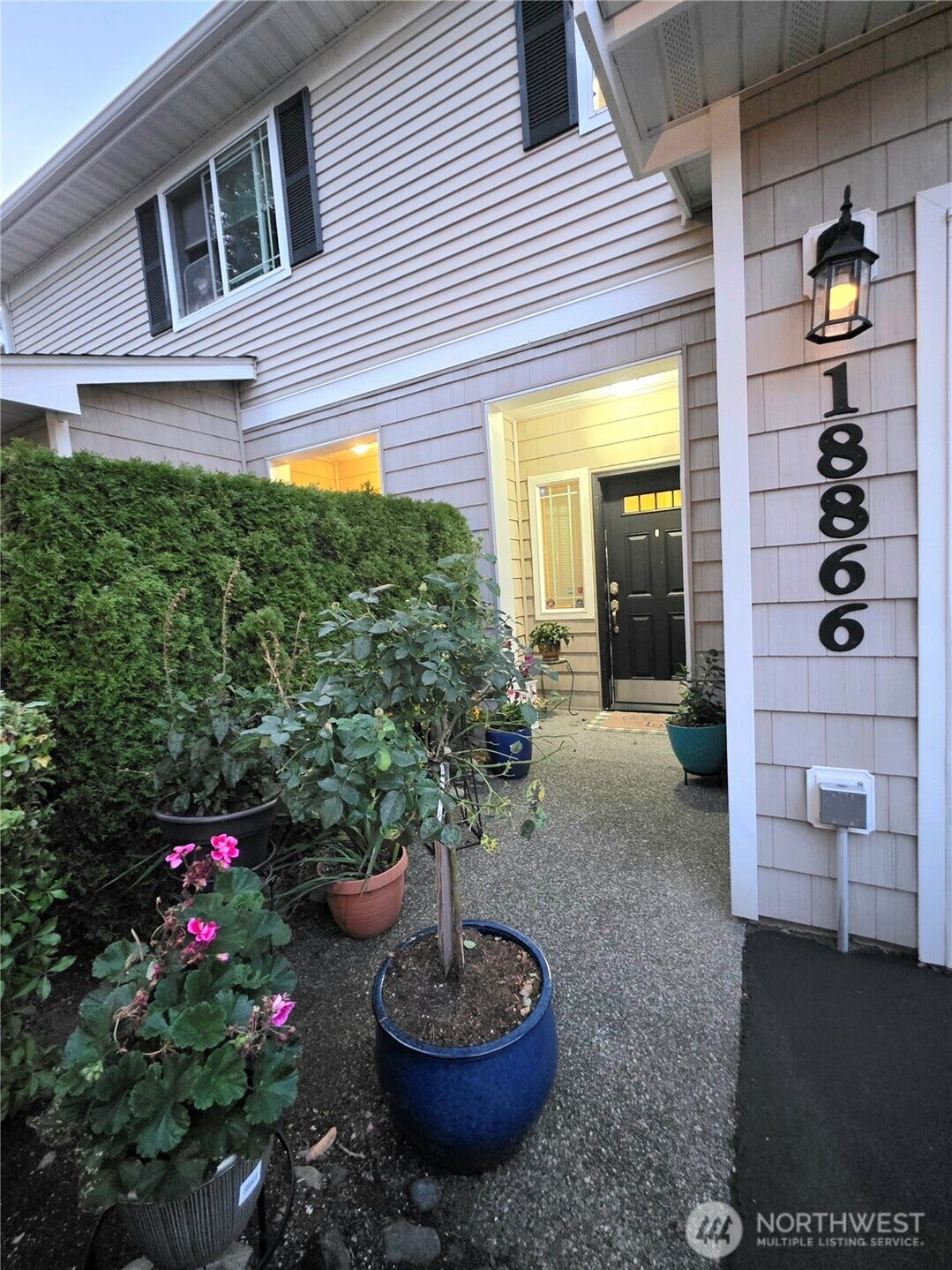 18866 108th Lane SE, Renton, WA 98055 Front patio with a warm, welcoming entry.