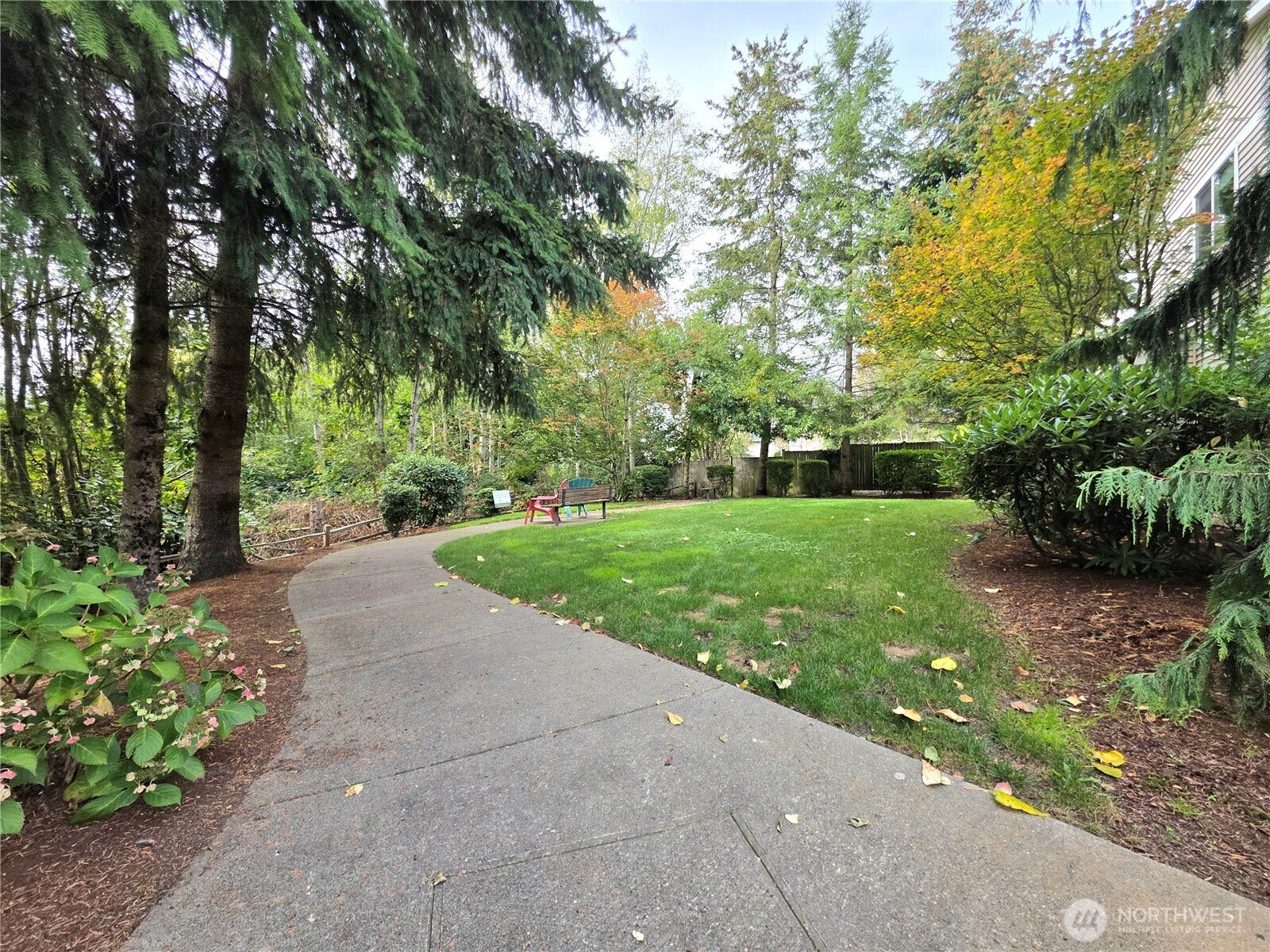 18866 108th Lane SE, Renton, WA 98055 Park with bench/sitting area right next to the residence building. Perfect for relaxing and for pet owners.