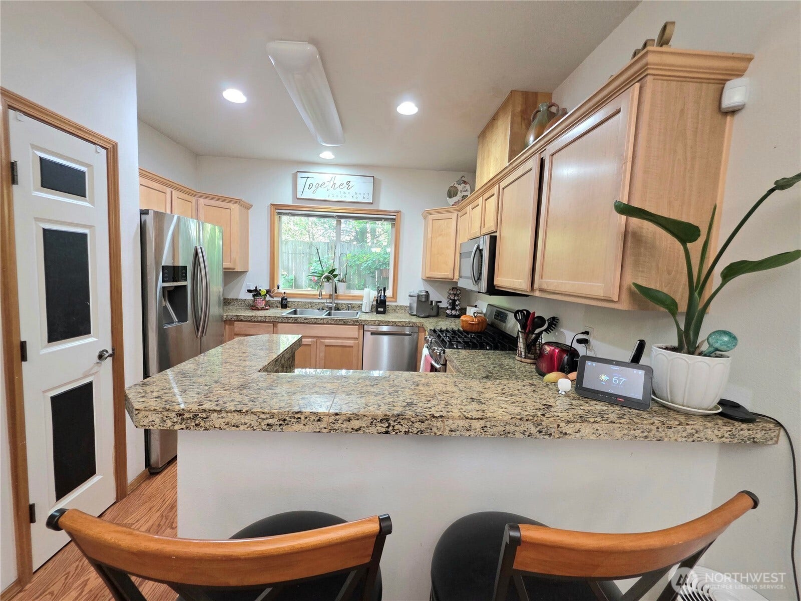 18866 108th Lane SE, Renton, WA 98055 Main floor - Chef inspired kitchen with an eating bar for quick grab and go meals.
