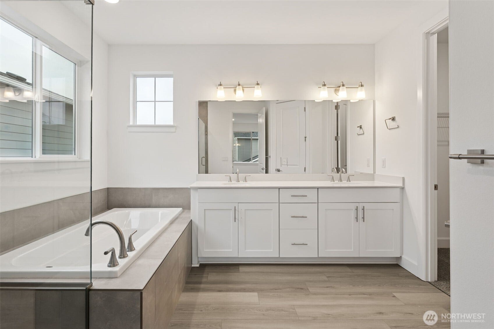 13928 207th Avenue Ct E, #1450, Bonney Lake, WA 98391 Photos are of another Donovan Plan. Colors and finishes may vary.