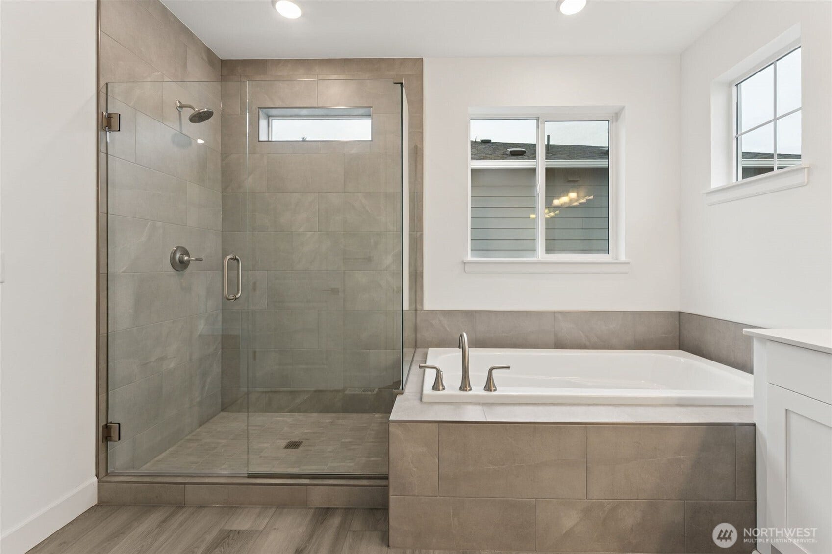 13928 207th Avenue Ct E, #1450, Bonney Lake, WA 98391 Photos are of another Donovan Plan. Colors and finishes may vary.
