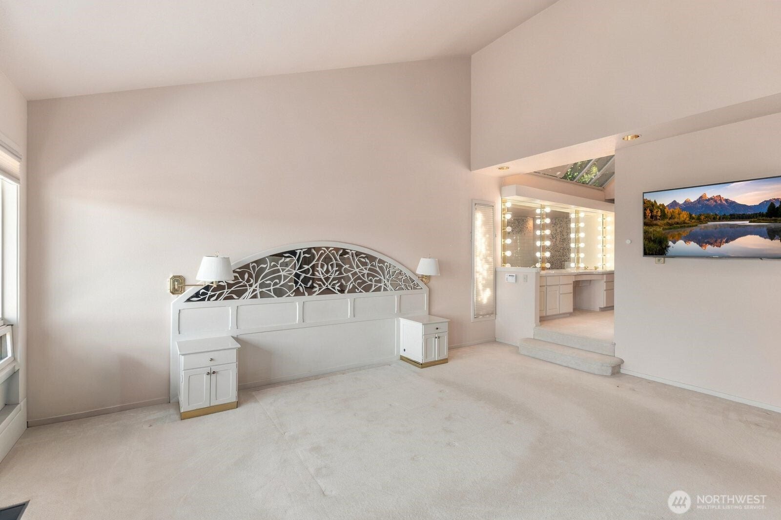 Sunken Primary with Fireplace and Wet Bar.