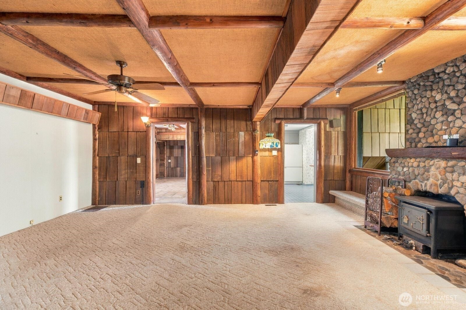 3 Fireplaces on the Main level. Wood Burning Stove off of the Kitchen in Family Room.