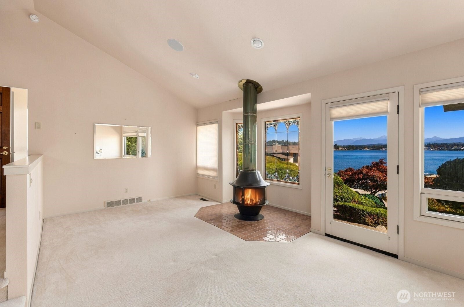 Primary Suite is Spacious, offering tremendous Lake and Mountain range views.