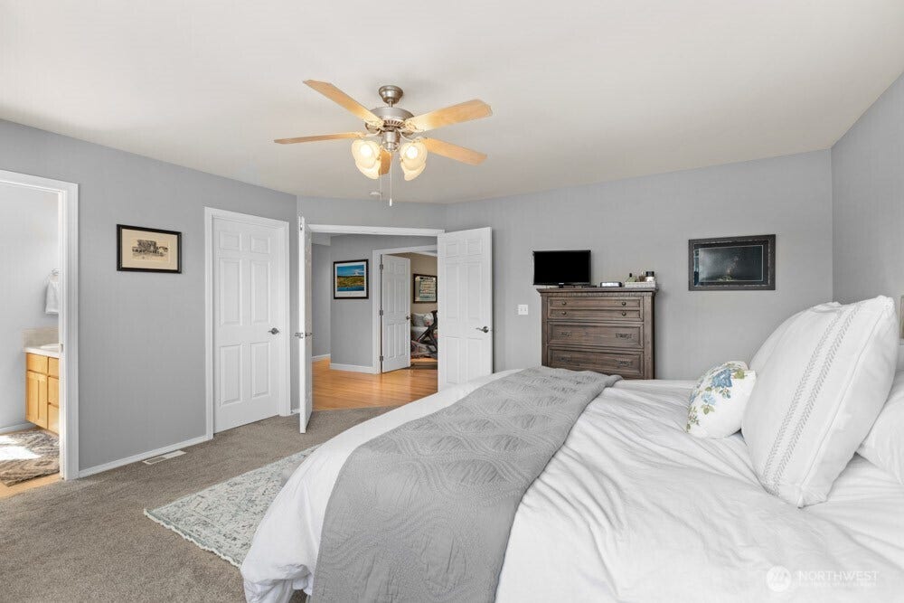 The primary suite is complete with a spacious 5-piece ensuite and generous walk-in closet.