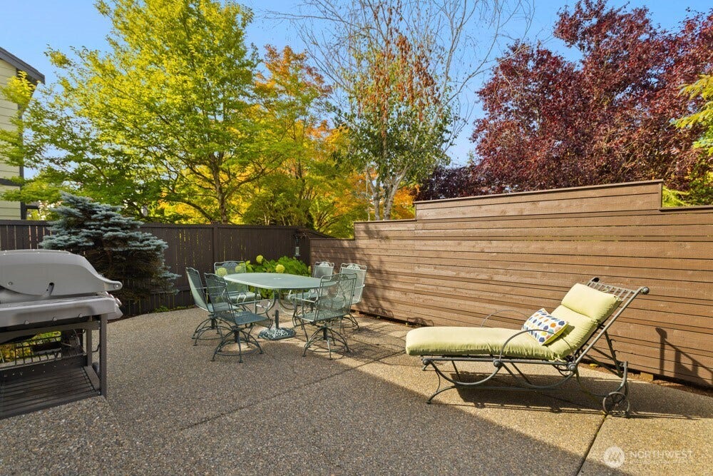A thoughtfully placed privacy screen creates a more private and comfortable outdoor space.