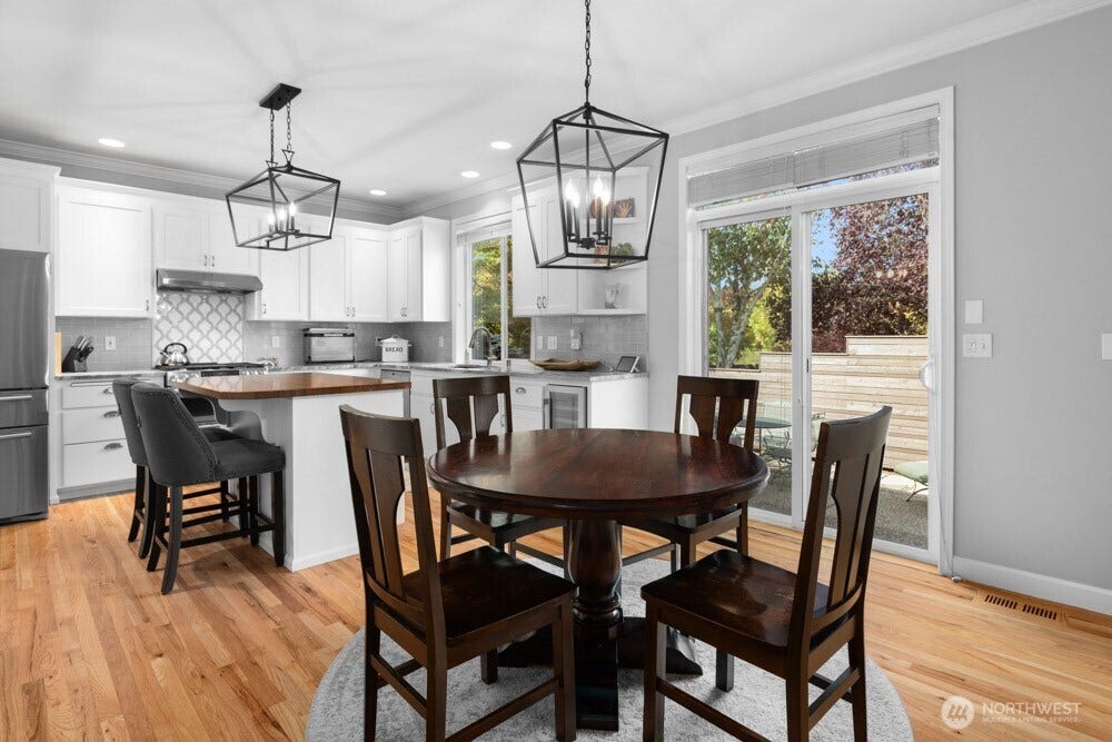 An eat-in dining area offers the perfect spot for casual meals, morning coffee or a quick bite.