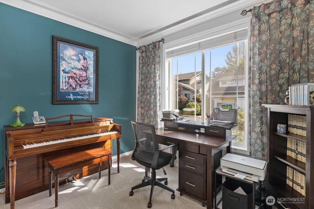 A main-floor office with French doors creates a quiet, dedicated space to work from home.