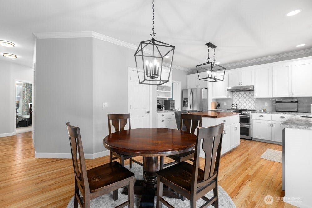 Head down the hall to find the laundry room, powder bath and a private main-floor office.