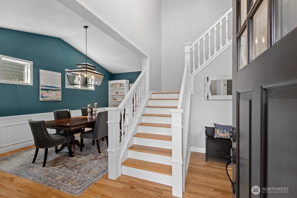 Impressive from the first stepthe stunning dining room welcomes you in with soaring vaulted ceilings.