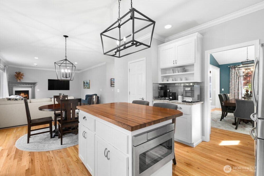 The beautifully updated kitchen is move-in ready and designed for everyday living and entertaining.