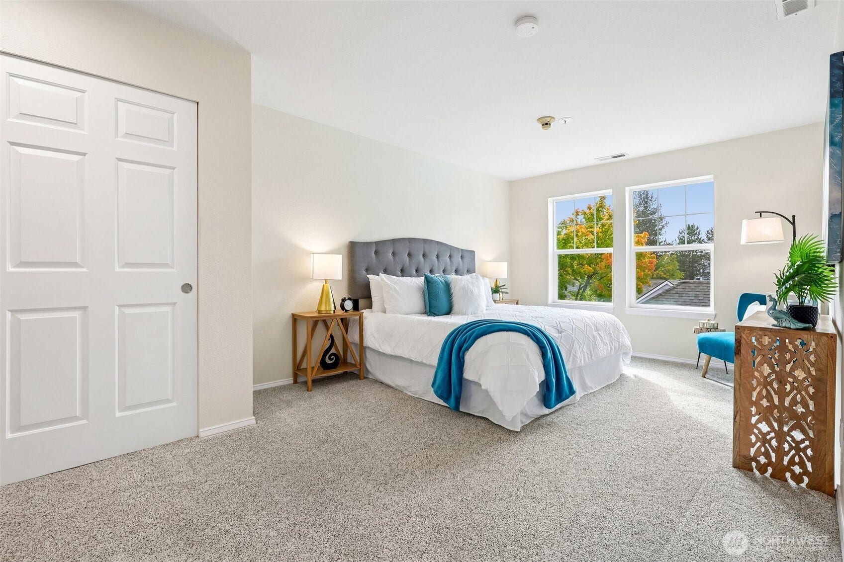Primary Bedroom is large - featuring a king size bed for staging