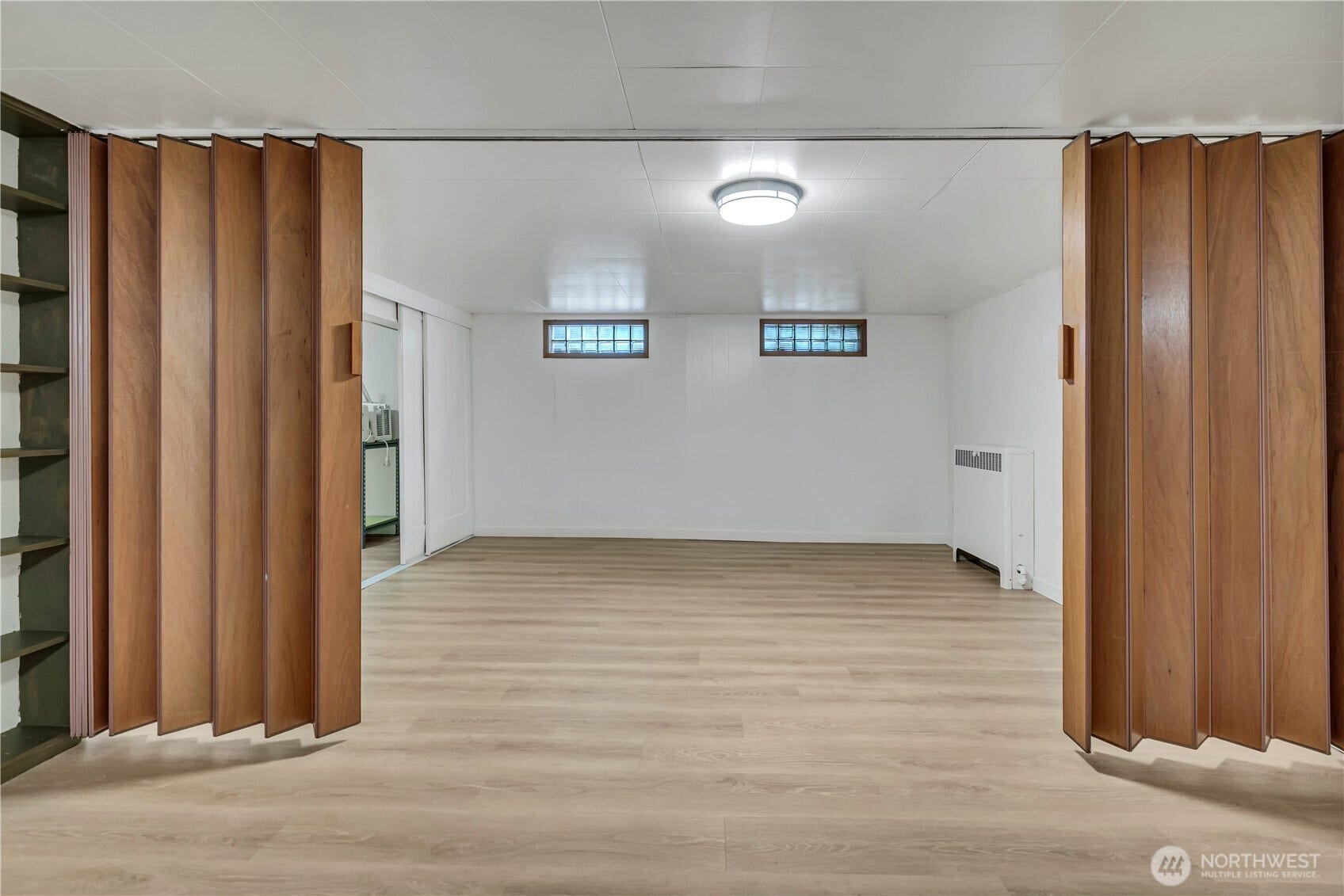 1910 N Union Avenue, Tacoma, WA 98406 Basement family room has these dividers to provide separate spaces as needed