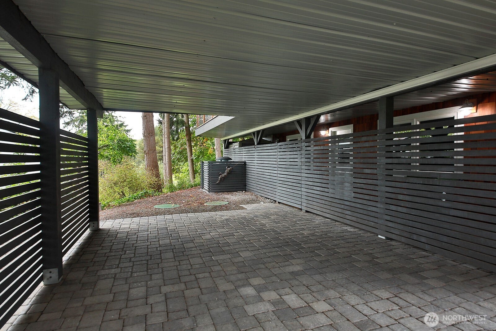 2496 Discovery Place, Langley, WA 98260 Covered carport. Separate entrance into the downstairs living area.