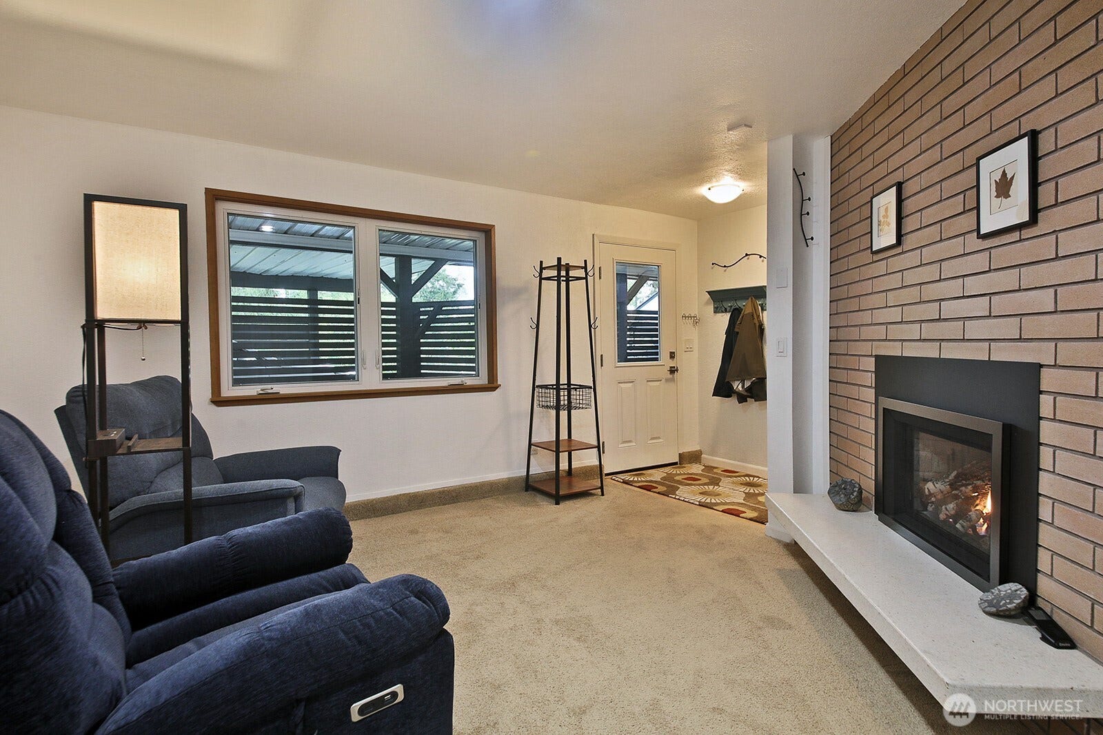 2496 Discovery Place, Langley, WA 98260 Propane Fireplace. Separate entrance off the covered carport/patio space.