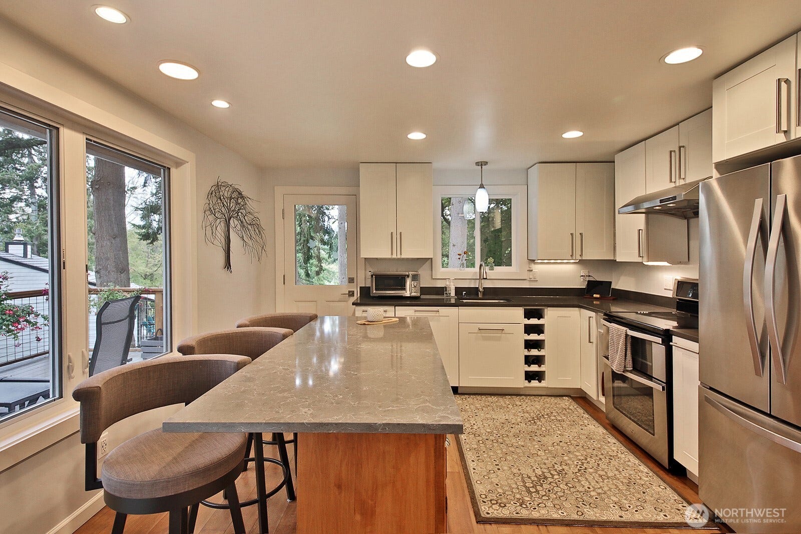 2496 Discovery Place, Langley, WA 98260 Kitchen island along with storage. SS appliances.