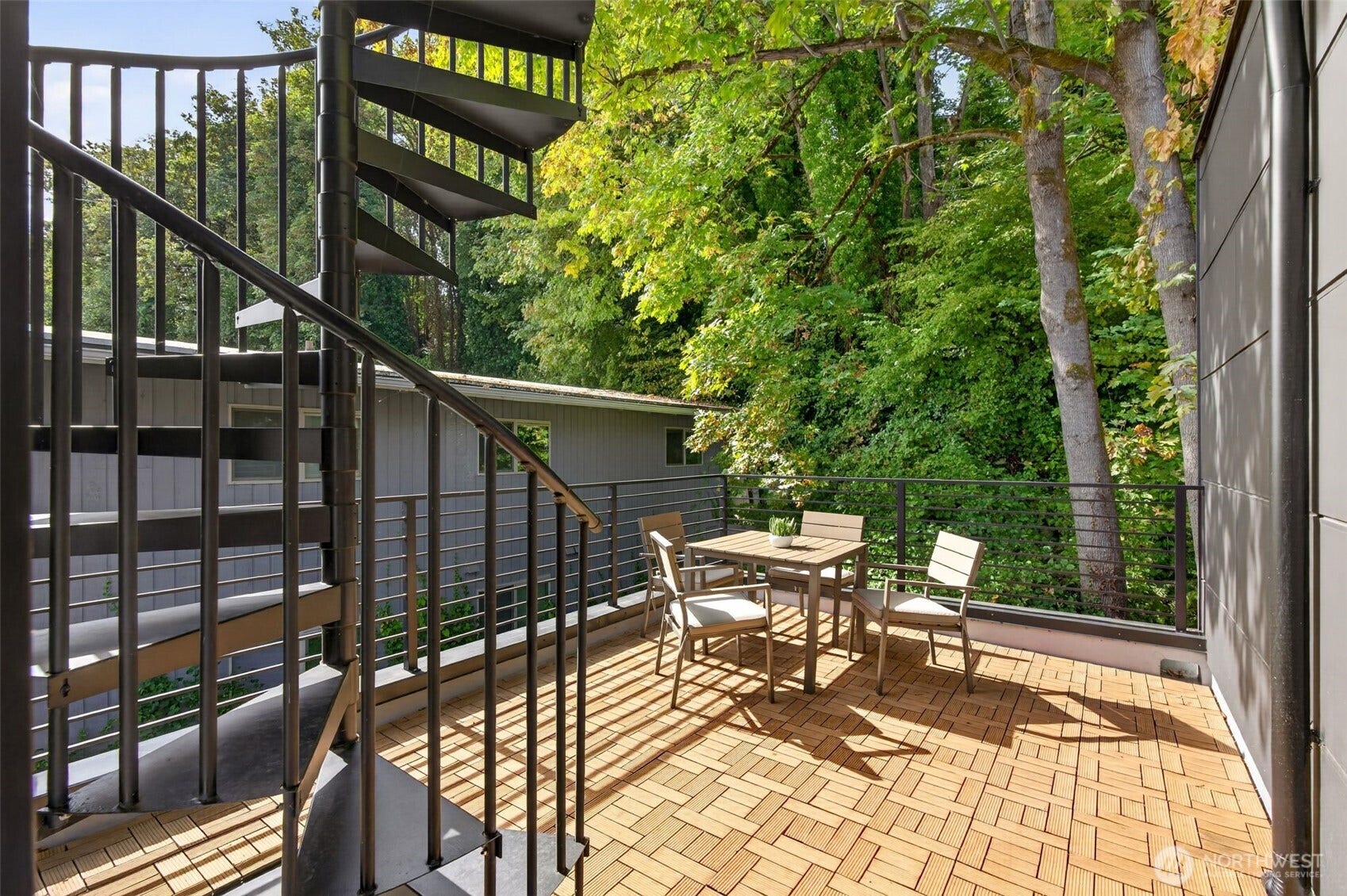 1615 S State Street, Seattle, WA 98144 The third-floor deck is a peaceful place to enjoy a meal outdoors or a cozy, sunny nook to lose yourself in a book. The spiral staircase will take you to your rooftop deck.