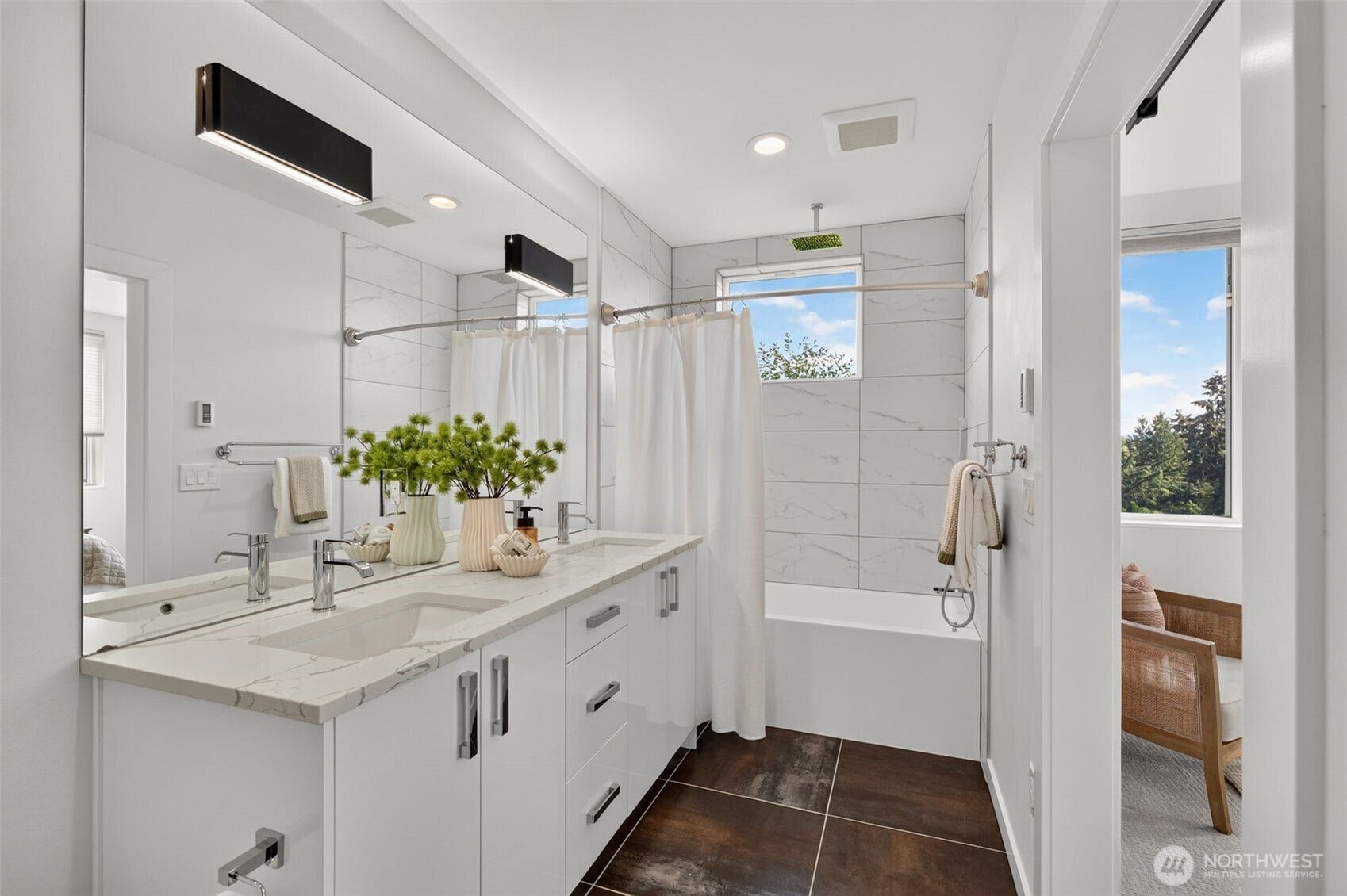 1615 S State Street, Seattle, WA 98144 Third floor Primary Suite- dual sinks, tub and rainhead shower. Large window brings plenty of natural light into this designer bath.