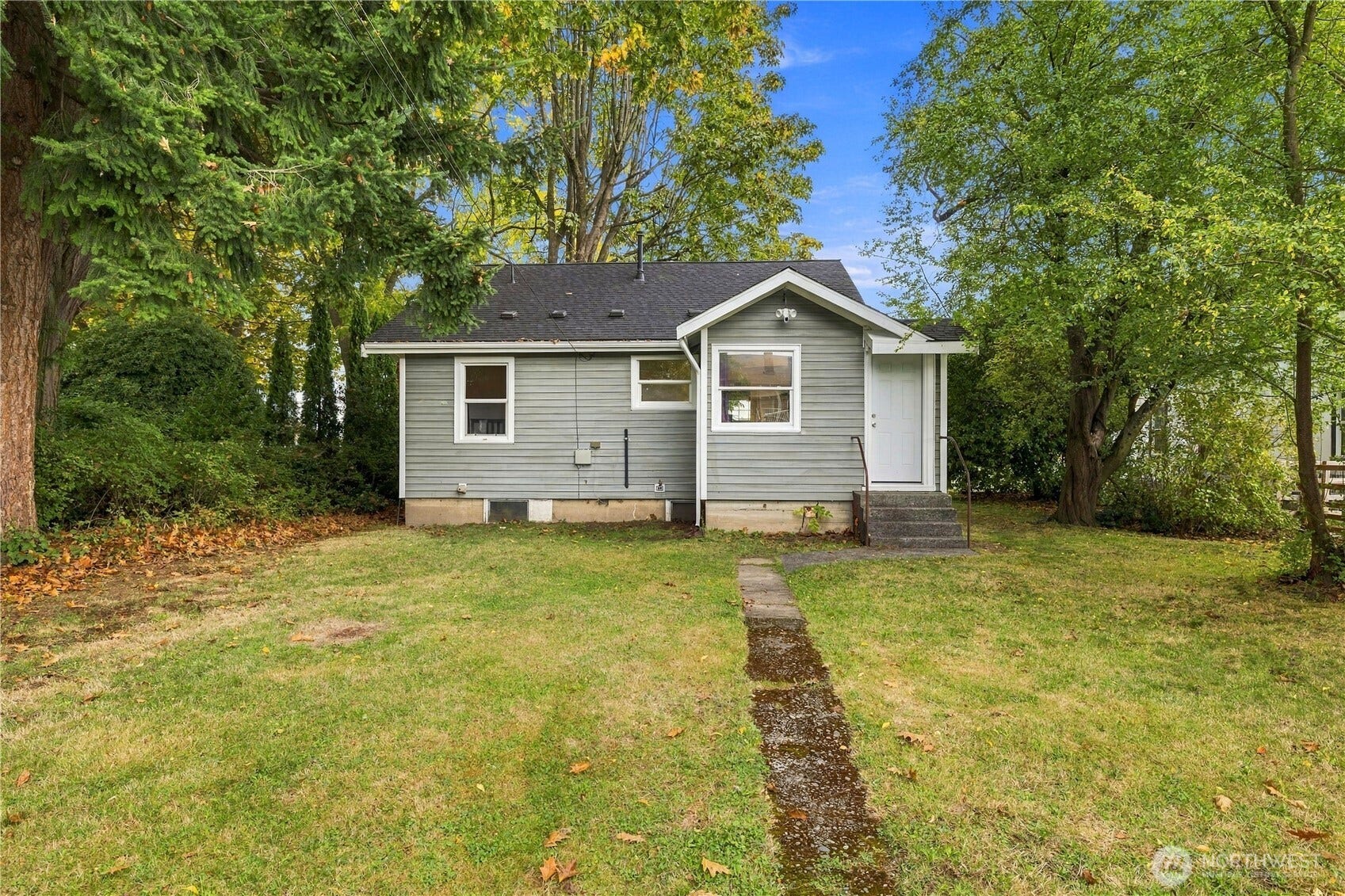 513 Warner Street, Sedro Woolley, WA 98284 Photo of the back of the home with a yard