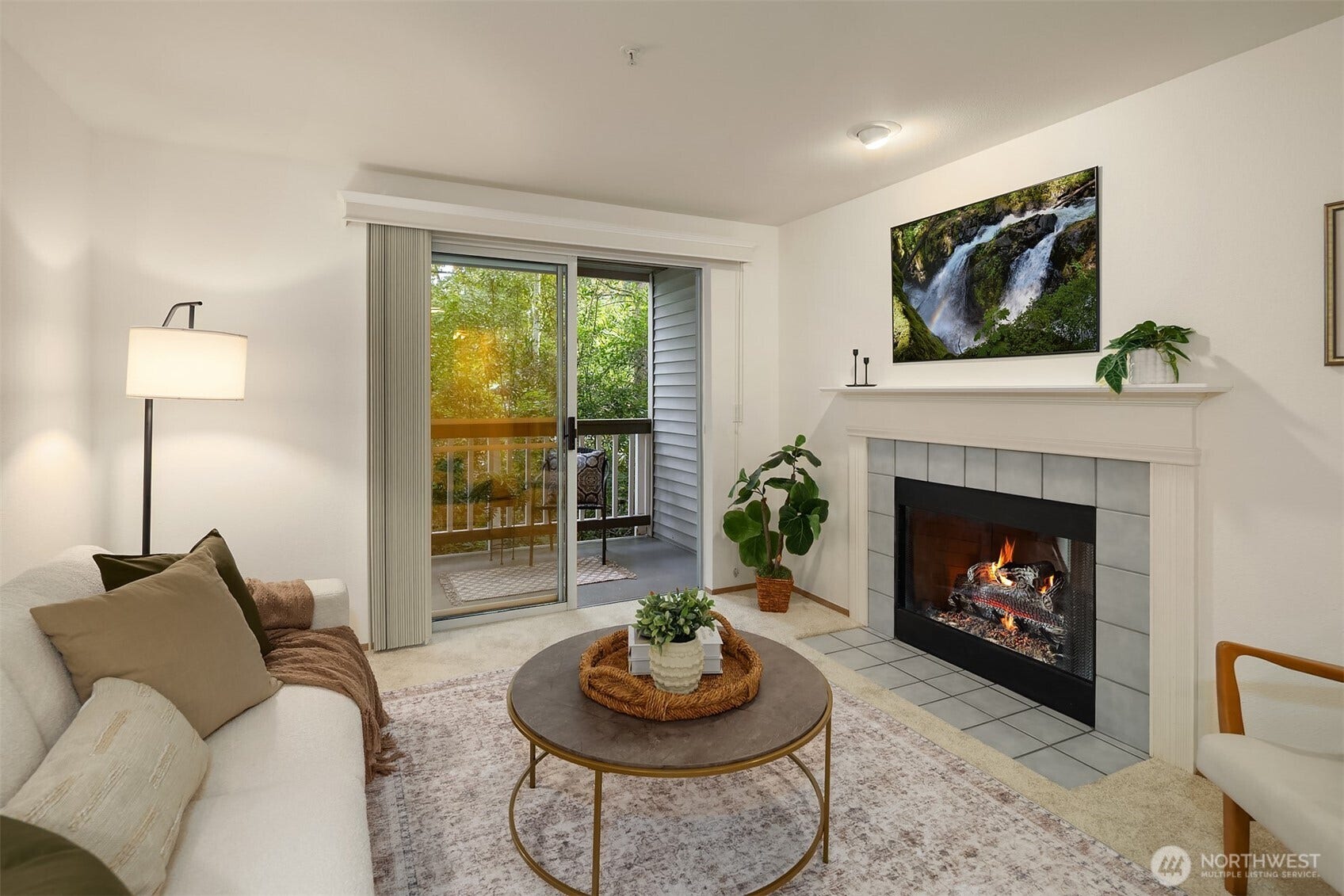 Wood burning fireplace with tile surround and mantle