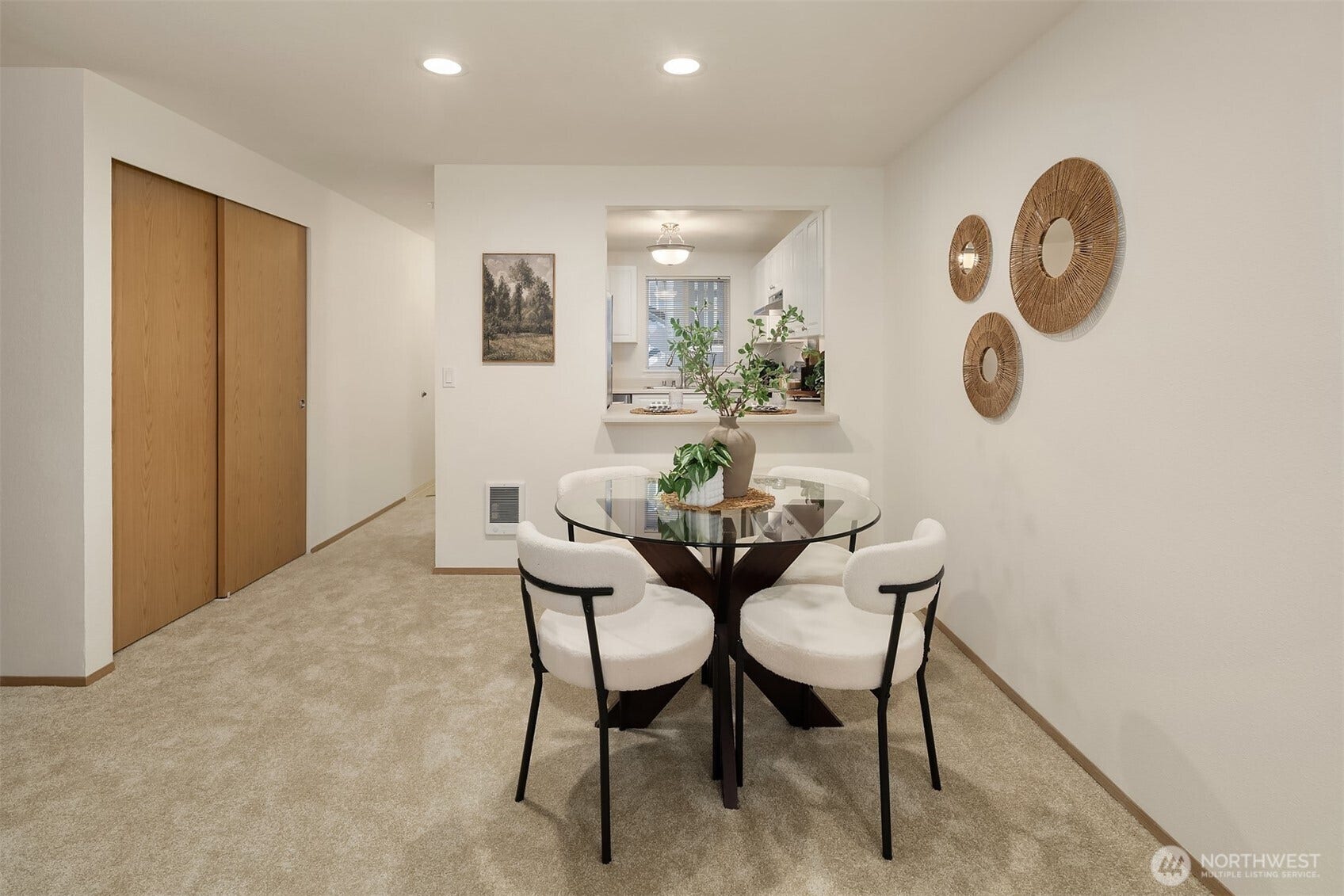 Big dining room also shows coat closet storage.