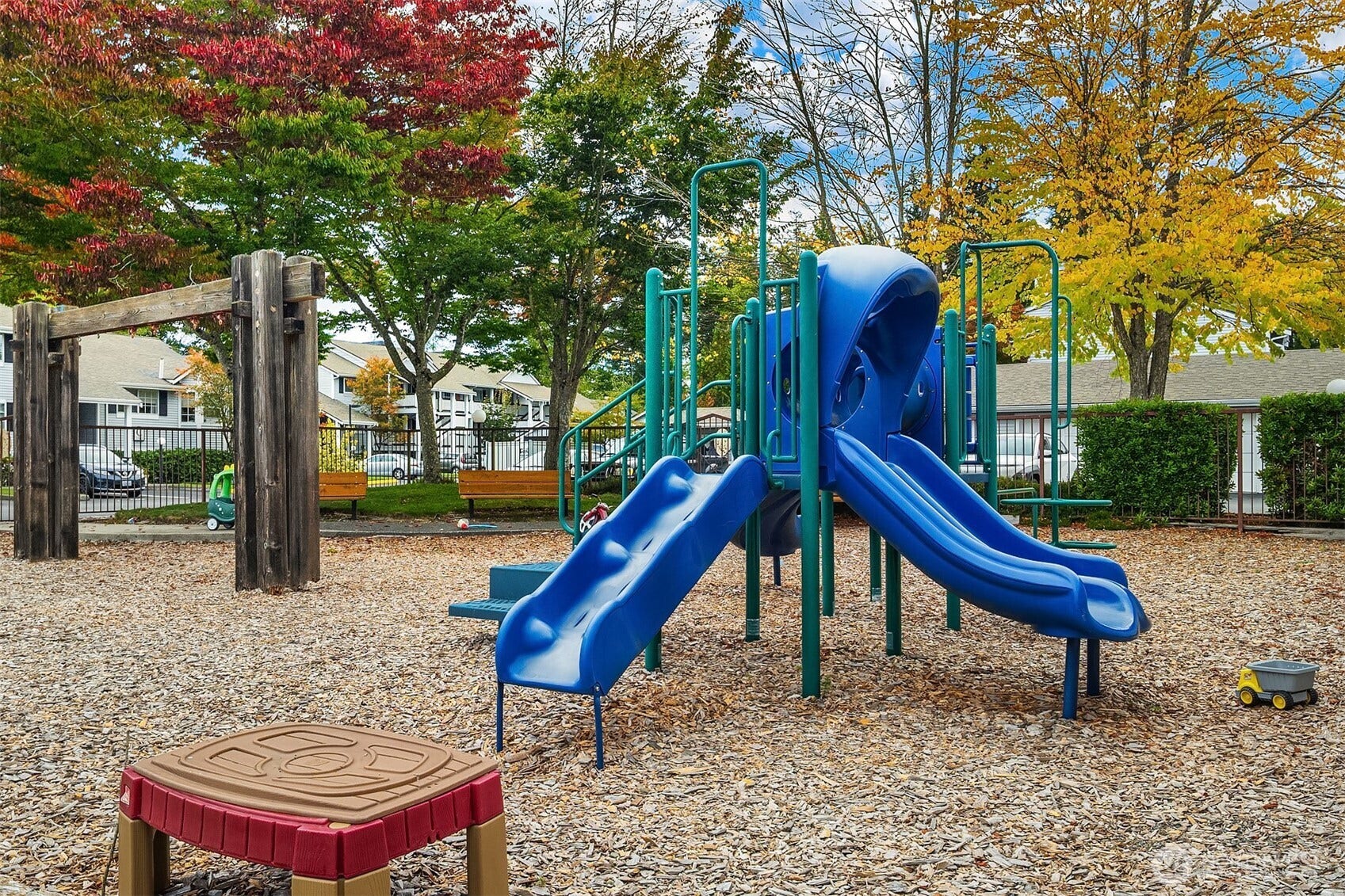 Community playground, trails and half court basketball too
