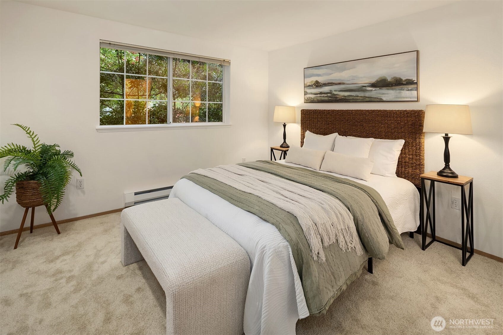 Primary bedroom fits up to a king size bed! Window faces South.