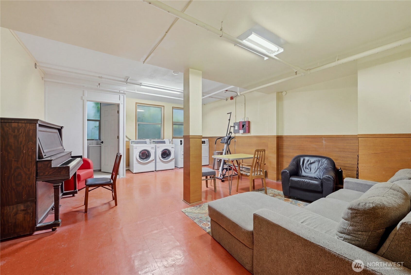 7 Harrison Street, #2, Seattle, WA 98109 Laundry is shared with seating and piano to relax and hang out.