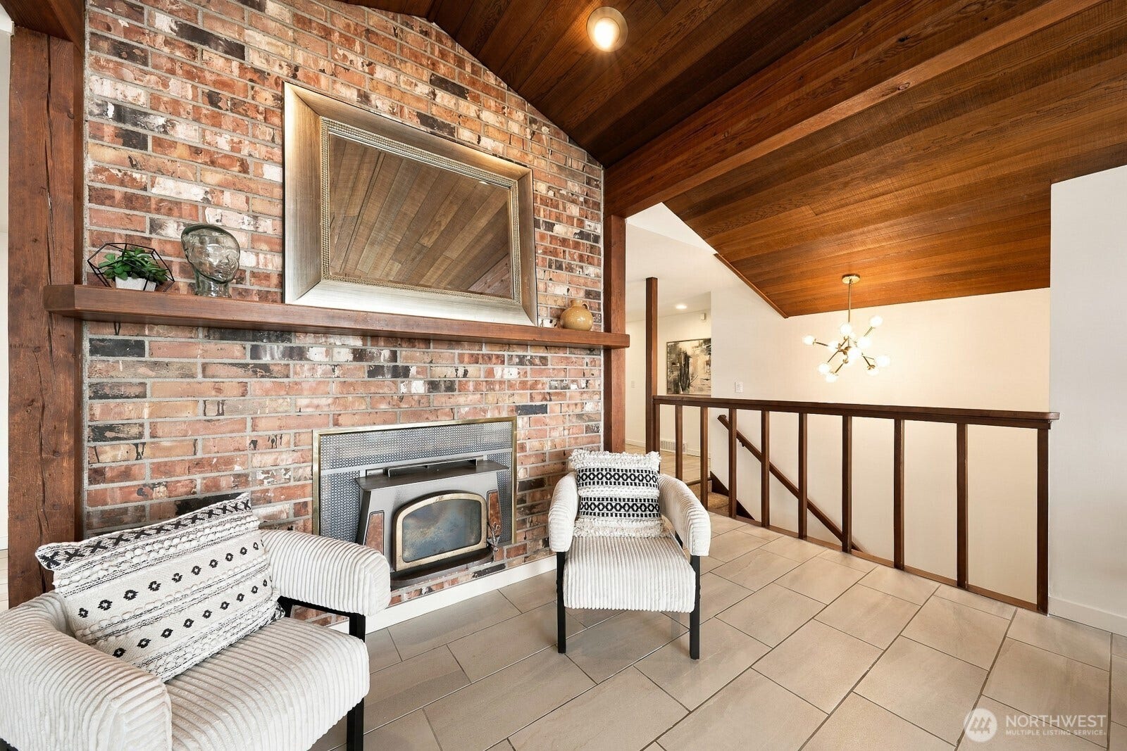 7114 164th Street SW, Edmonds, WA 98026 Brick Fireplace. stairs leading to the lower level