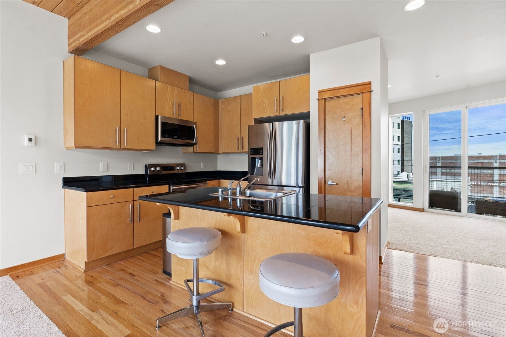 2520 Jefferson Avenue, #C, Tacoma, WA 98402 Kitchen island has a breakfast bar.