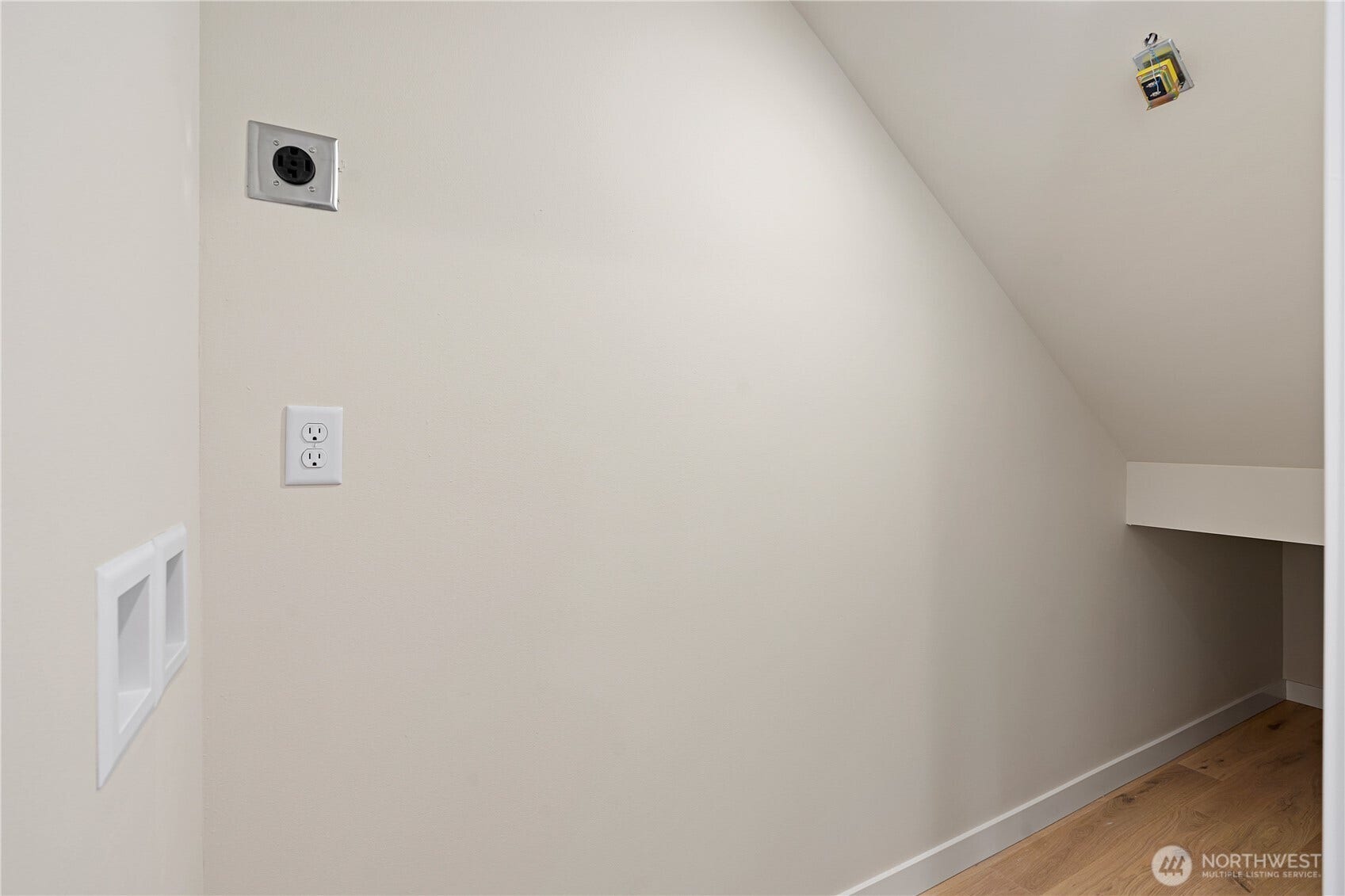 8043 19th Avenue NE, Seattle, WA 98115 Laundry hook-ups and storage under the stairs.