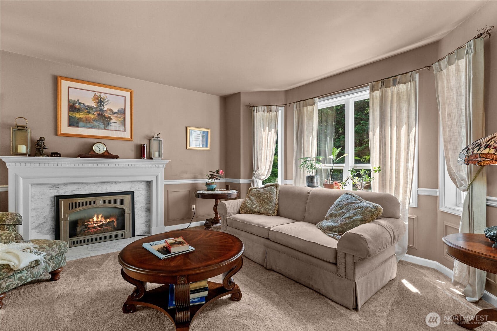 23924 SE 186th Street, Maple Valley, WA 98038 Cozy gas fireplace. Formal living room elegance!