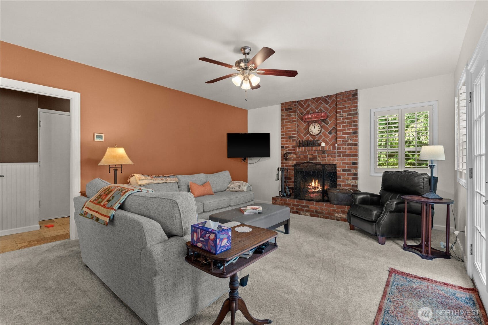 23924 SE 186th Street, Maple Valley, WA 98038 This cozy family room with a real wood burning fireplace is the place to be! Football and Fire!