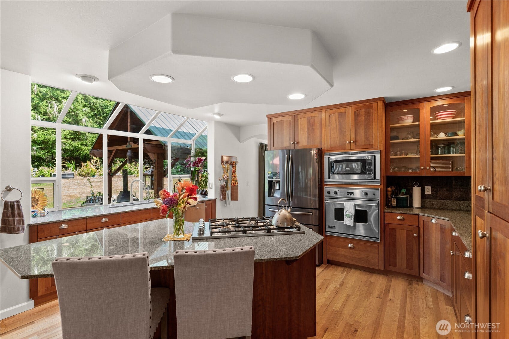 23924 SE 186th Street, Maple Valley, WA 98038 The expansive garden windows brings nature into your kitchen. Watch the Elk, deer, bunnies and many more animals pass thru your yard.