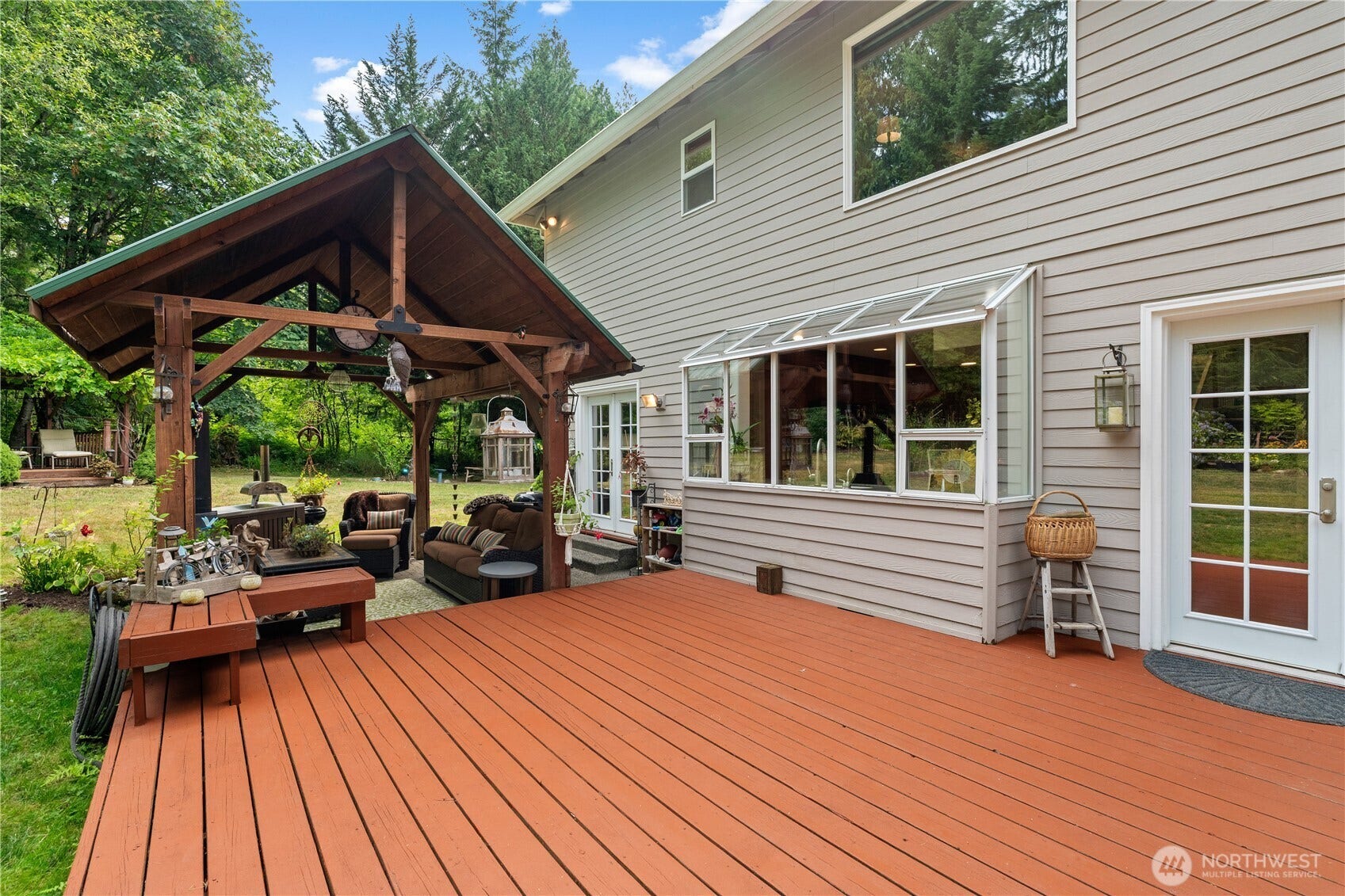 23924 SE 186th Street, Maple Valley, WA 98038 Endless entertaining year round on this well thought out designed, 1200 sq ft deck and covered patio area !