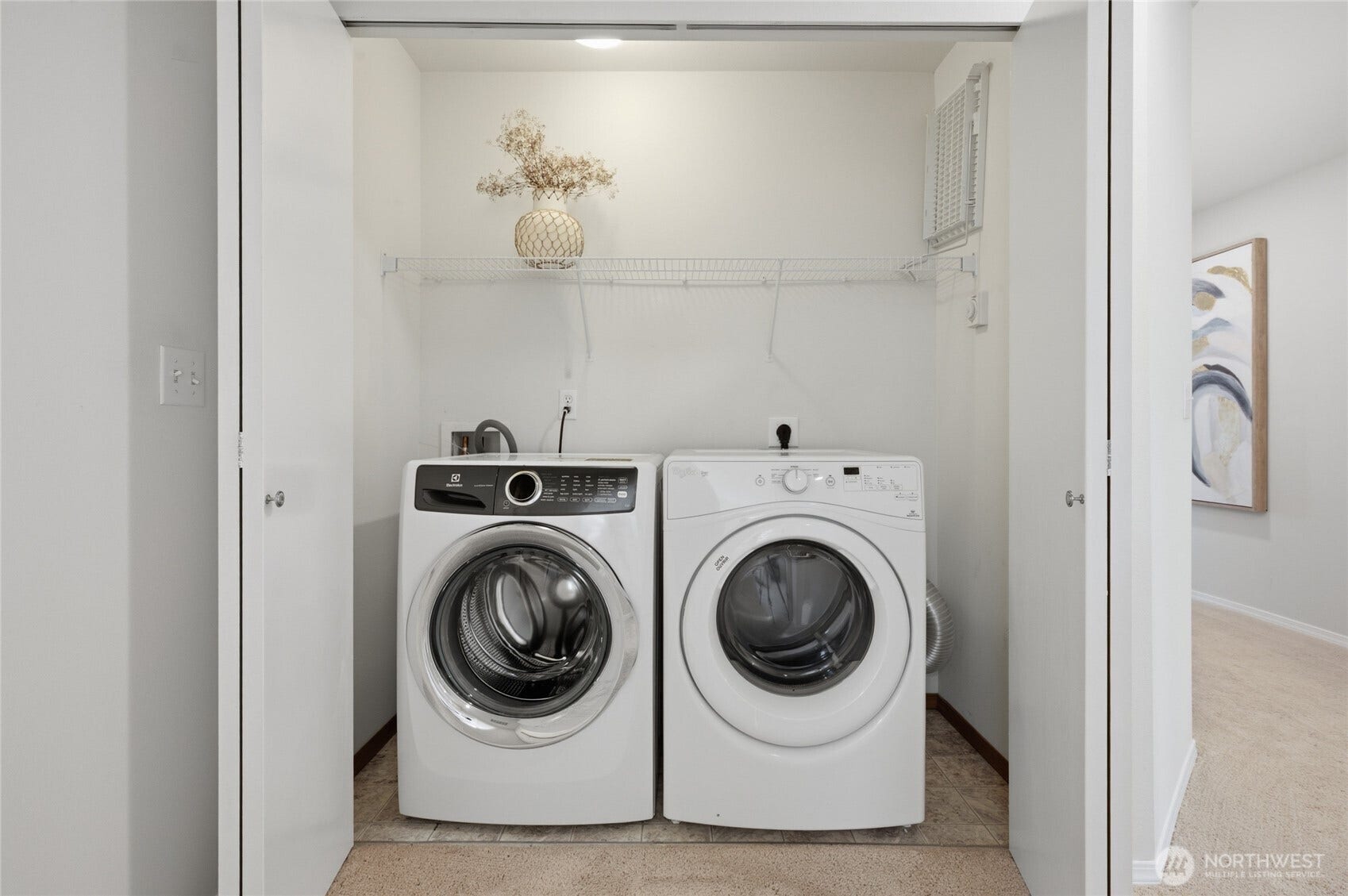 Upper level laundry area.