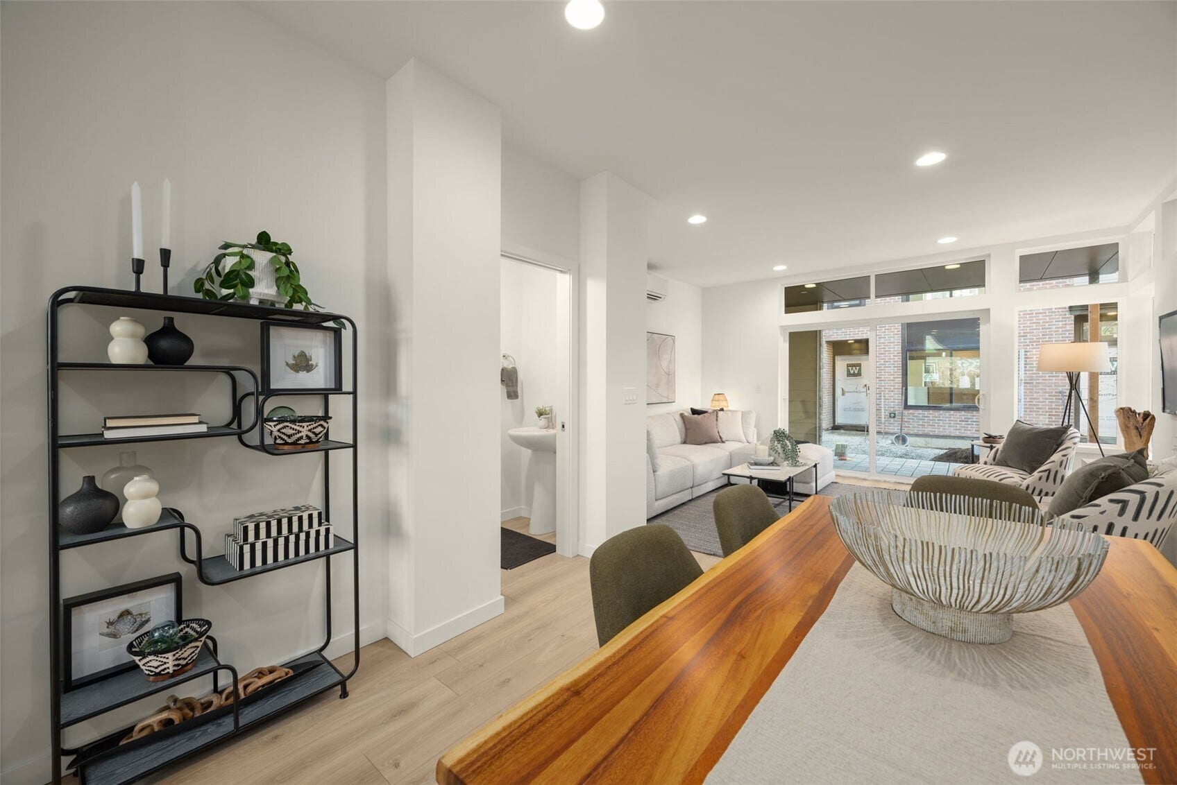 Open-concept layout connecting living, dining and kitchen