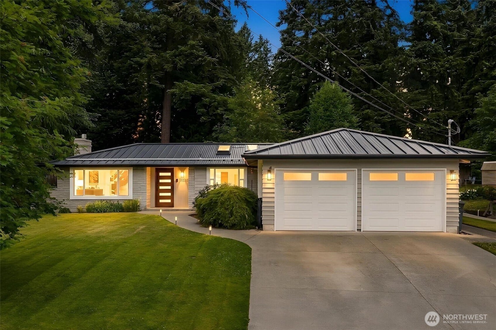 Large corner lot - .277ac or 12,052 sq ft. Single level living with 3 outbuildings