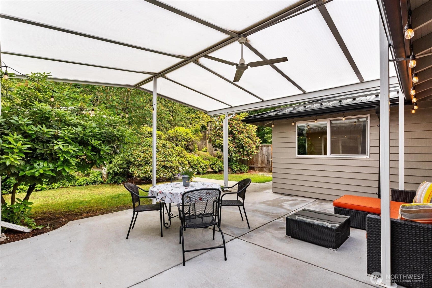 Covered patio is a space you'll be drawn to every day of the year.