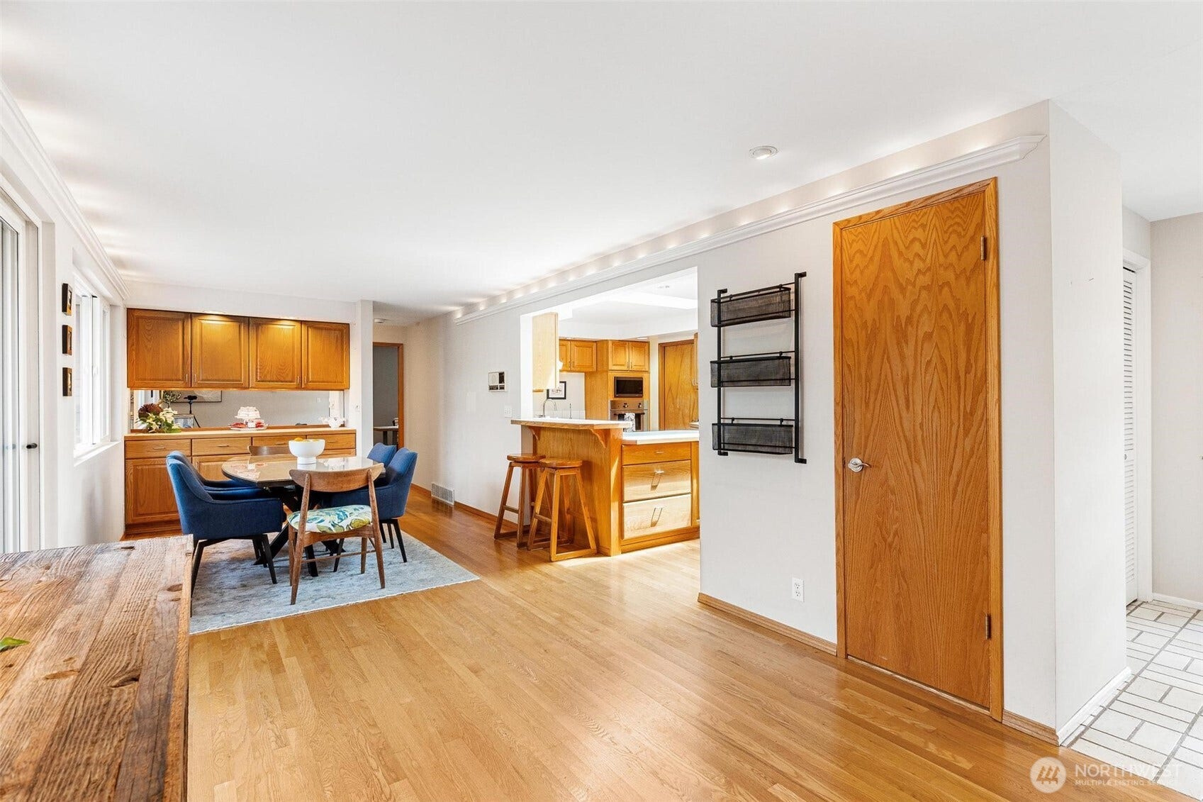 Dining Room. Wood floors run throughout the house.