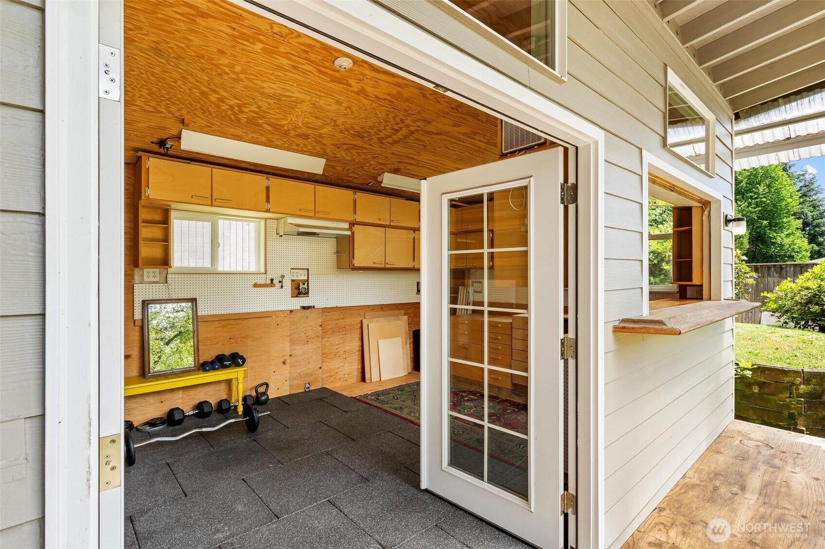 A home office, workout space / gym, woodworking studio.