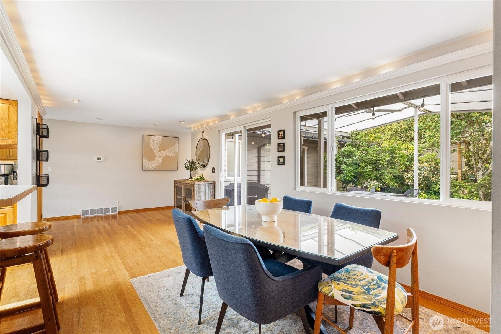 Dining room looking out to the covered patio.  Sliding door access.