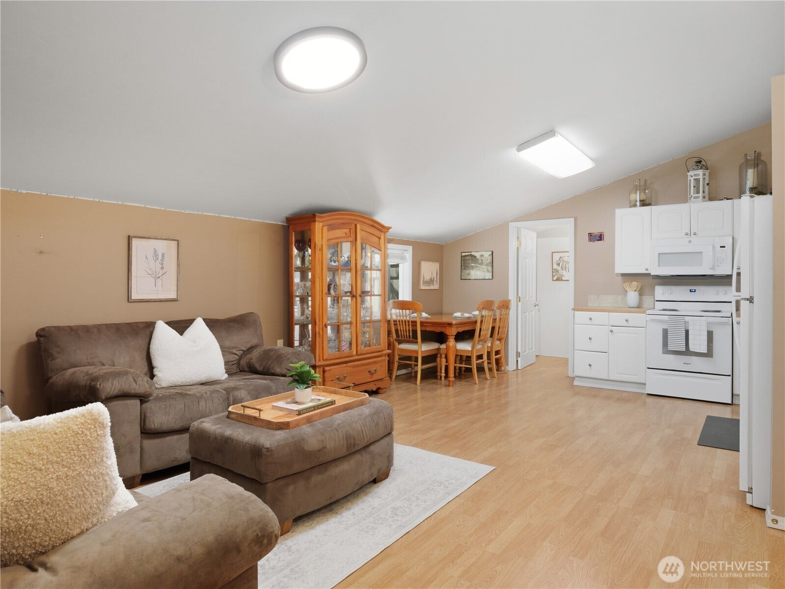 Versatile living space featuring an open-concept layout with a comfortable gathering area, dining space, kitchenette, and private bath. Ideal for guests, extended living arrangements, hobbies, recreation, or flexible everyday use.