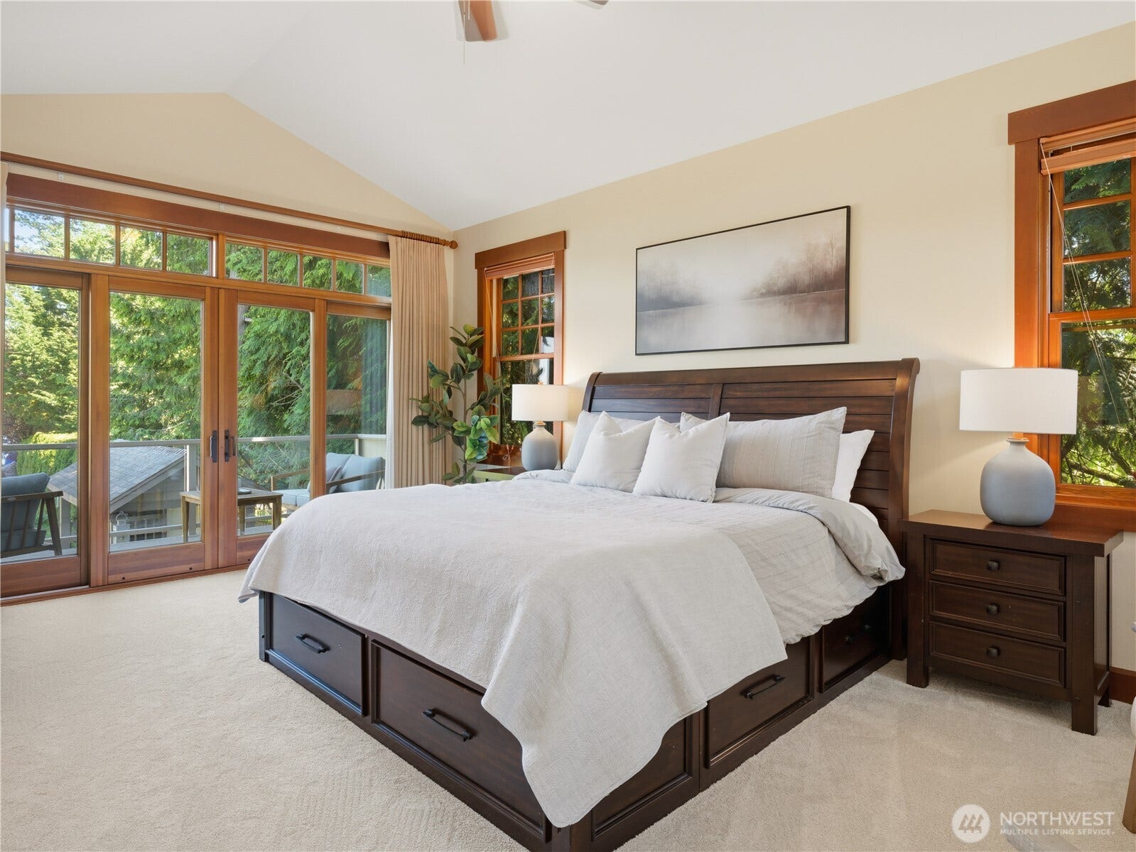 Natural light fills the room throughout the day, while the generous layout provides flexibility for additional seating or relaxation space.