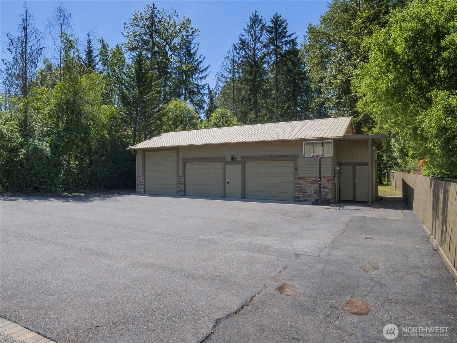 Beyond the shoreline, this impressive detached garage creates the infrastructure that makes waterfront living effortless. With multiple garage bays, extensive parking, and ample room for boats, trailers, water toys, recreational equipment, and projects, this property is equipped for every season of lake living.