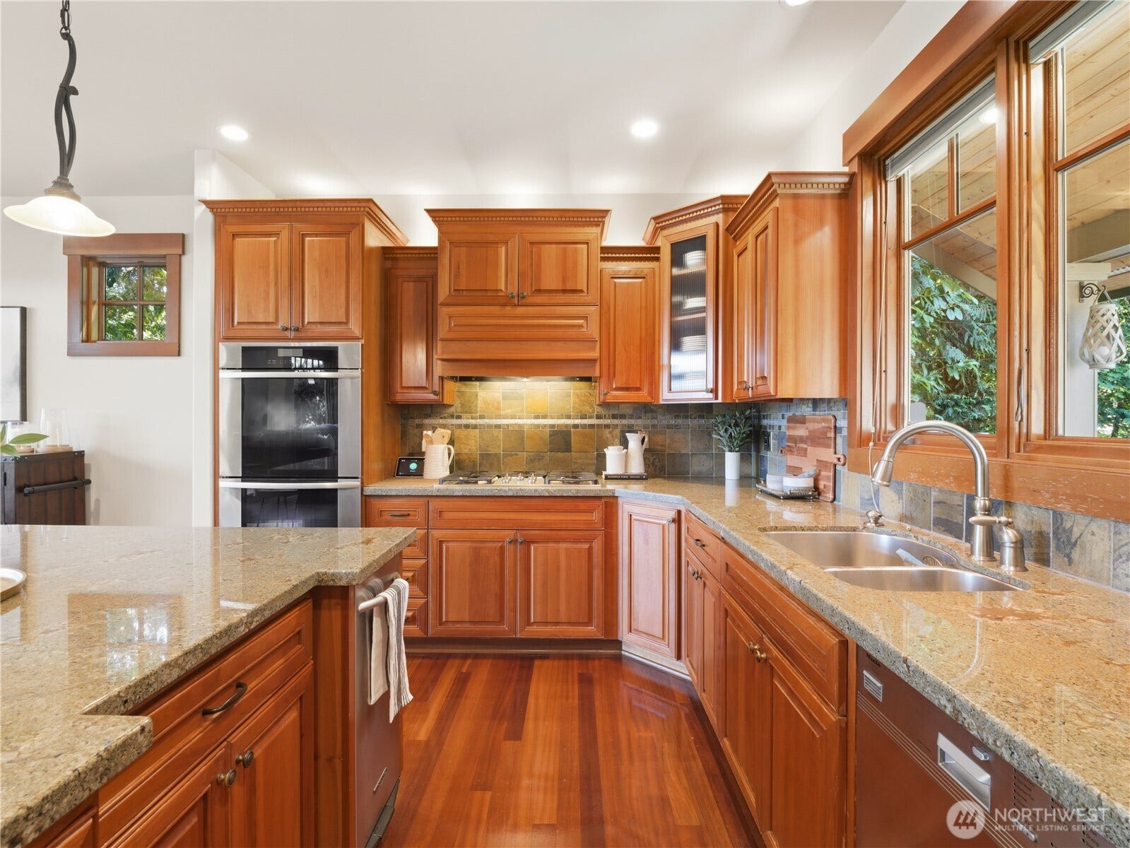 The chef-inspired kitchen combines timeless craftsmanship with exceptional functionality.
