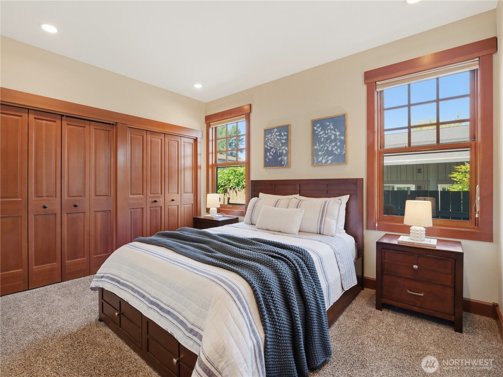 Bright and inviting secondary bedroom feature large windows, generous closet storage, and comfortable layouts.