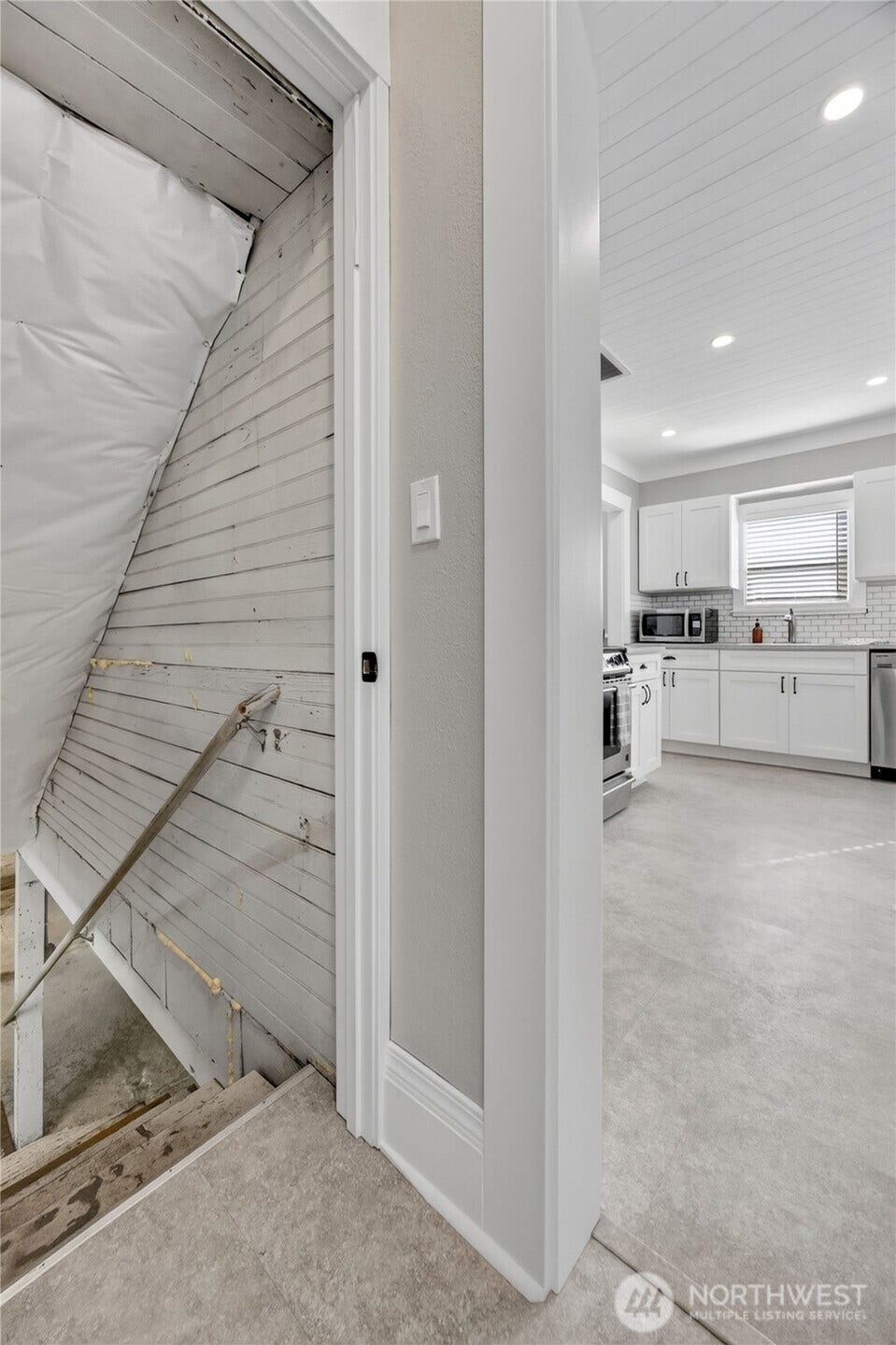 A separate basement entrance adds flexibility for future plans.